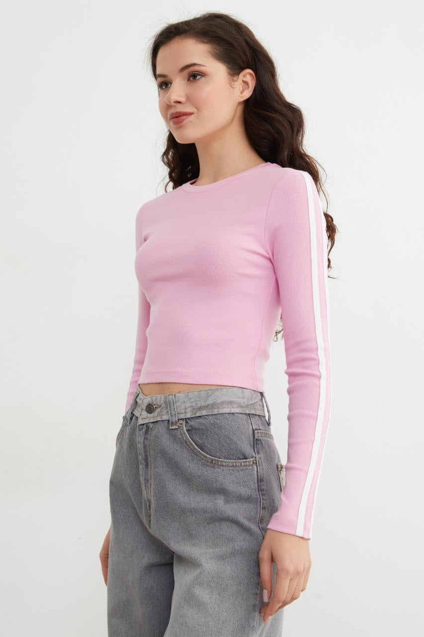 Pink long-sleeve crop top with white sleeve stripes