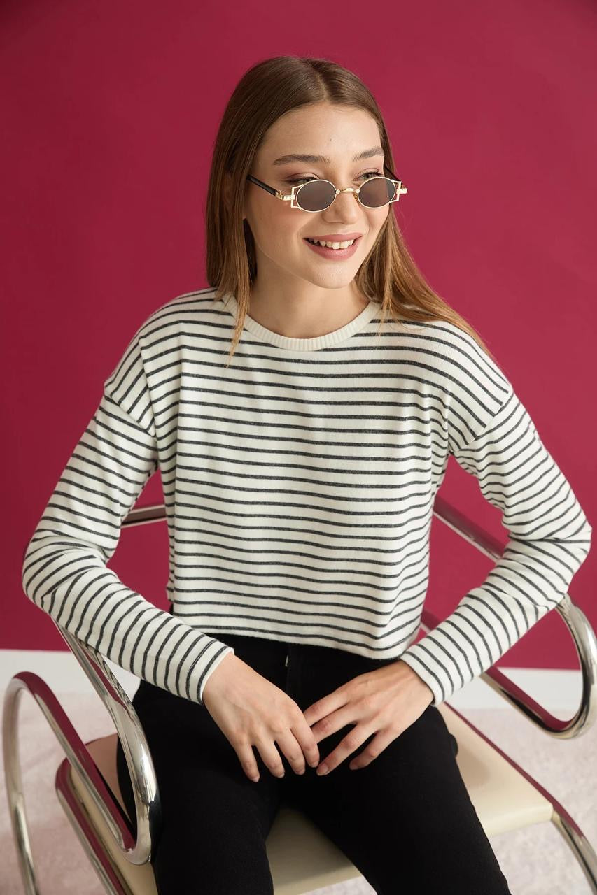Cream cropped long-sleeve top with black horizontal stripes