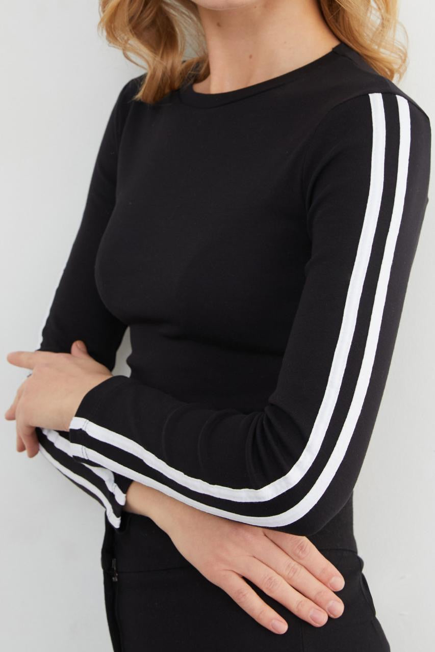 Black long-sleeve crop top with white double sleeve stripes